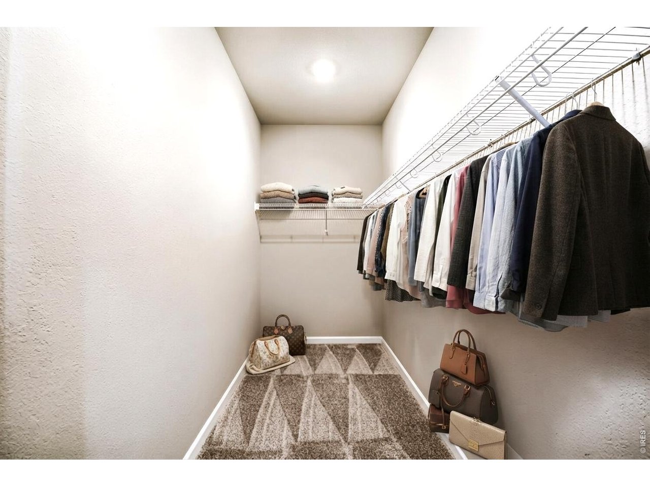 Property Photo 10 Primary walk-in closet