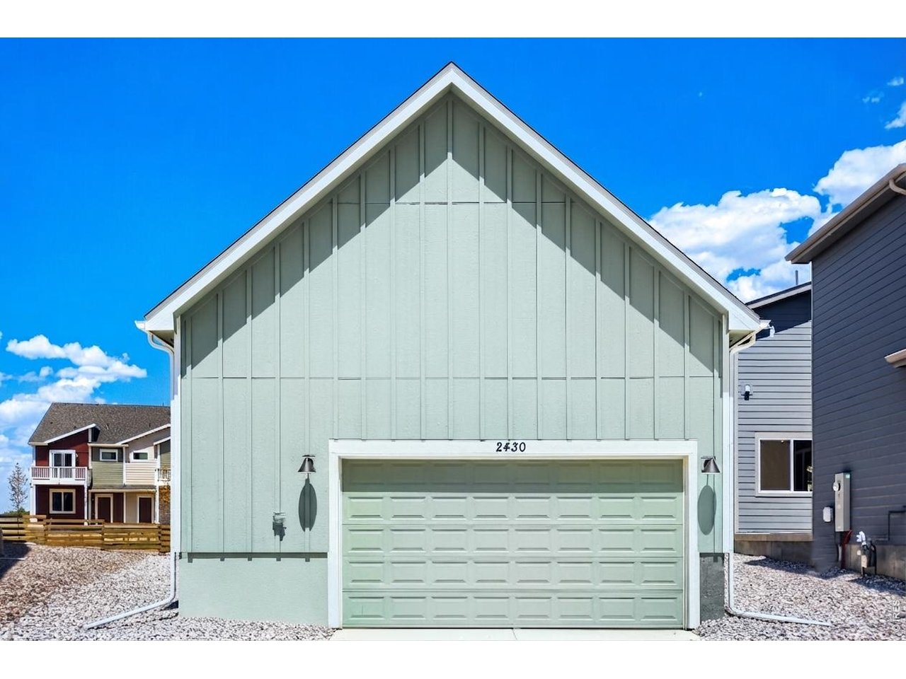 Property Photo 19 Two-car garage with an extra bump-out for added storage