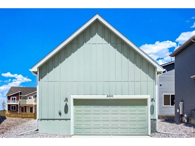 Property Photo 19 Two-car garage with an extra bump-out for added storage