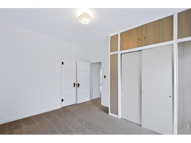 Property Photo 19 Bedroom in back of the house, also has two closets.