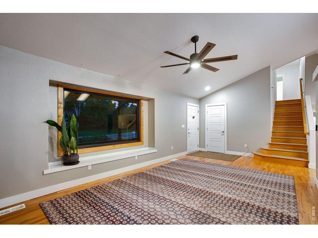 Property Photo 11 hardwood floors, vaulted ceilings, fan, plus central AC