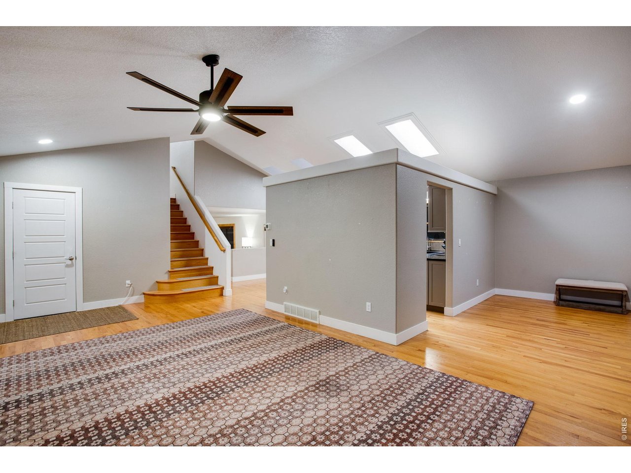 Property Photo 10 hardwood floors, vaulted ceilings, fan, plus central AC