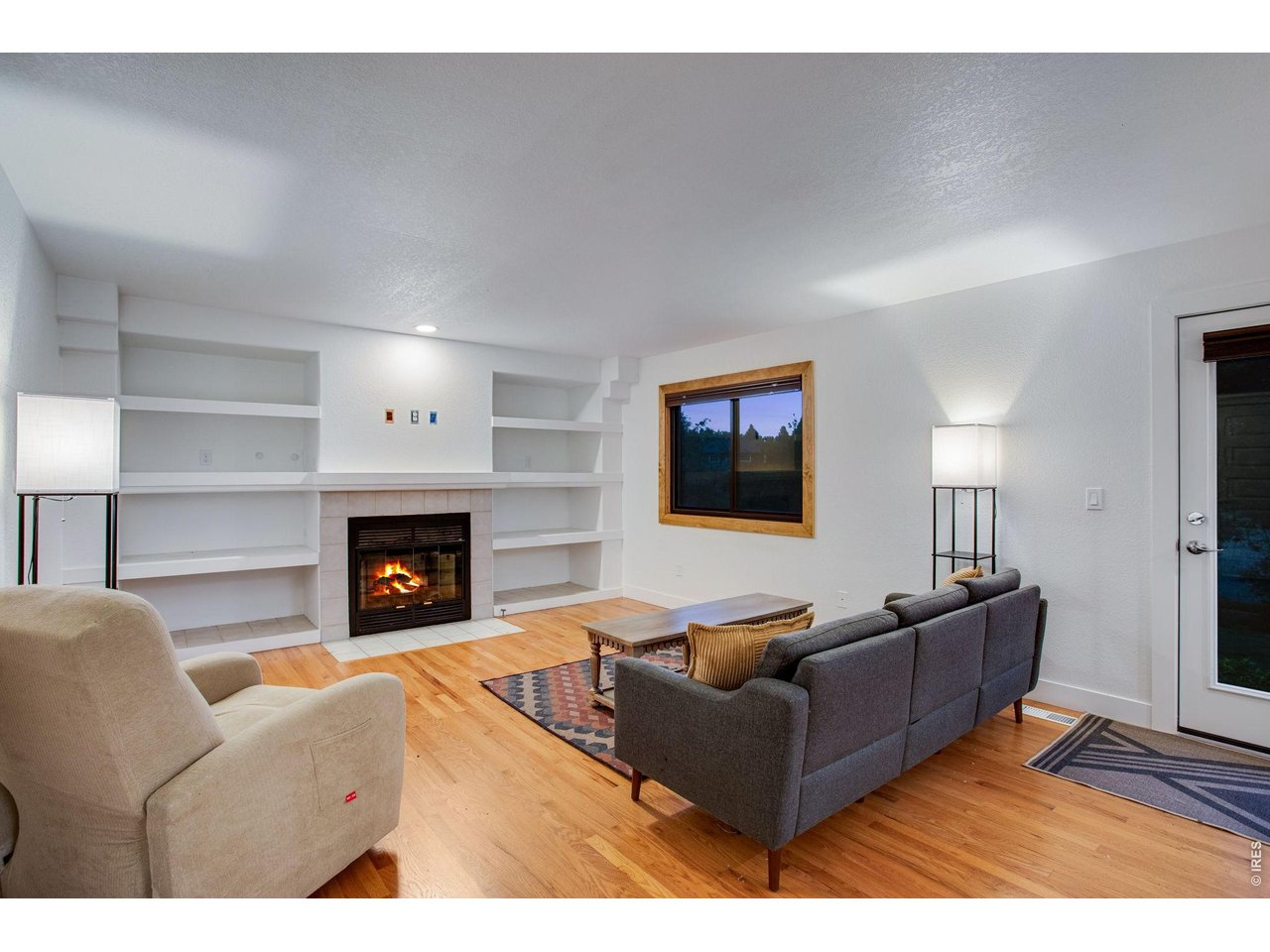 Property Photo 14 Lower level family room with gas fireplace