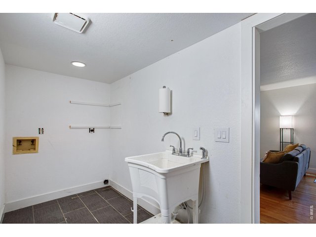 Property Photo 23 Main floor laundry with utility sink
