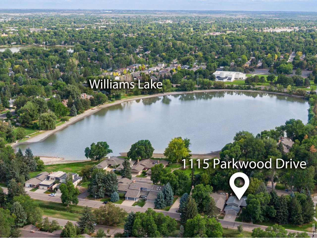 Property Photo 2 The landscaped Sherwood lateral in front and Williams Lake views to the south! 1115 Parkwood has been completed transformed w/ sophisticated finishes, In the desirable Parkwood community! Nearly 2,000 finished SQFT!