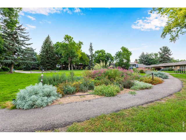 Property Photo 37 Gorgeous community landscaping all around! Beautiful trails - Parkwood is regarded as one of the best locations/communities in Fort Collins! To the east side of Parkwood - don't miss the Powertrail!