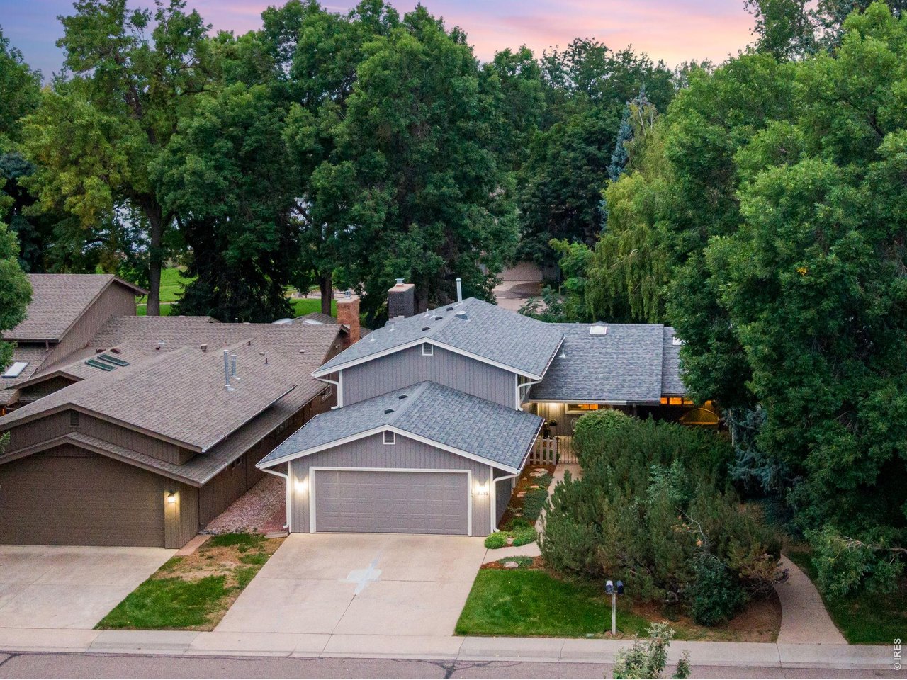 Property Photo 6 Backs to private HOA open space, newer 2019 class IV roof, new ext. paint and 5" gutters in 2024.