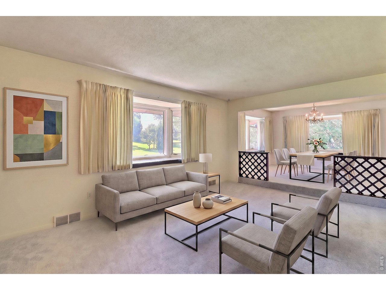 Property Photo 6 Front Door Opens to this Lovely Living Room and Formal Dining Room