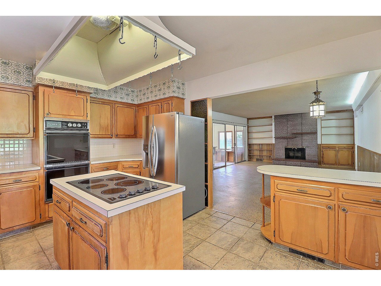 Property Photo 14 Plus a Kitchen Stovetop Island