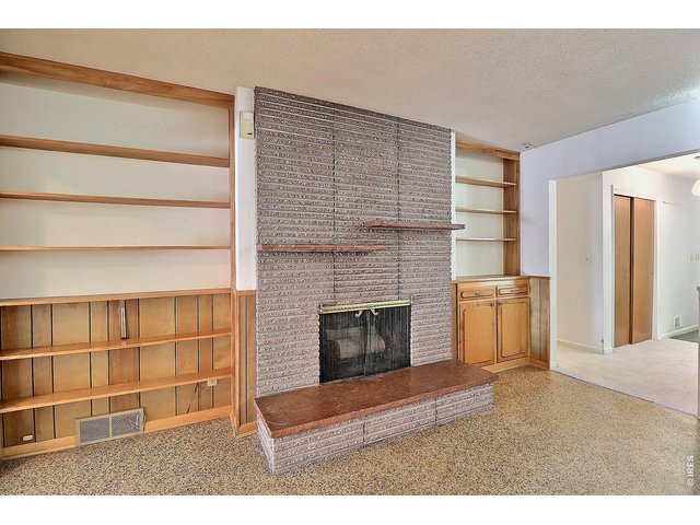 Property Photo 17 with Built-Ins and Fireplace