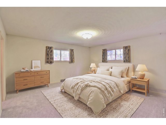 Property Photo 19 Main Floor Primary Bedroom--Virtually Staged