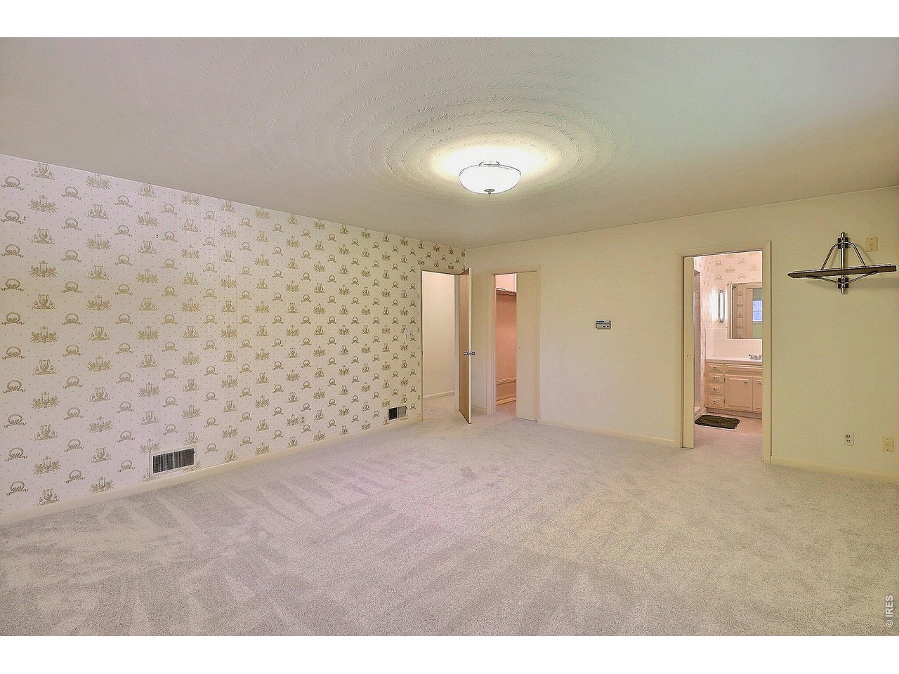 Property Photo 20 Main Floor Primary Bedroom