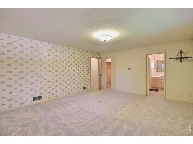 Property Photo 20 Main Floor Primary Bedroom