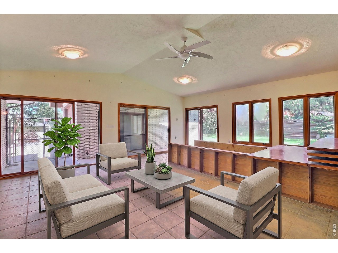 Property Photo 29 Enclosed Sun Room--Virtually Staged