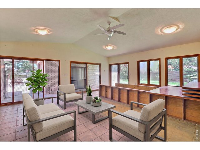 Property Photo 29 Enclosed Sun Room--Virtually Staged