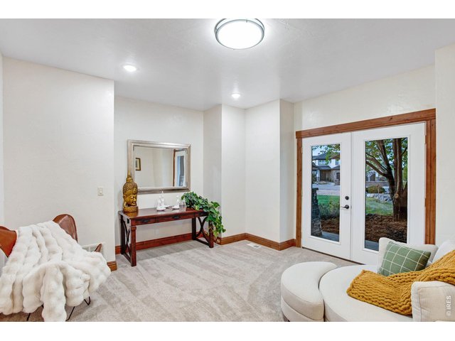 Property Photo 27 Front music room or formal living room with patio access