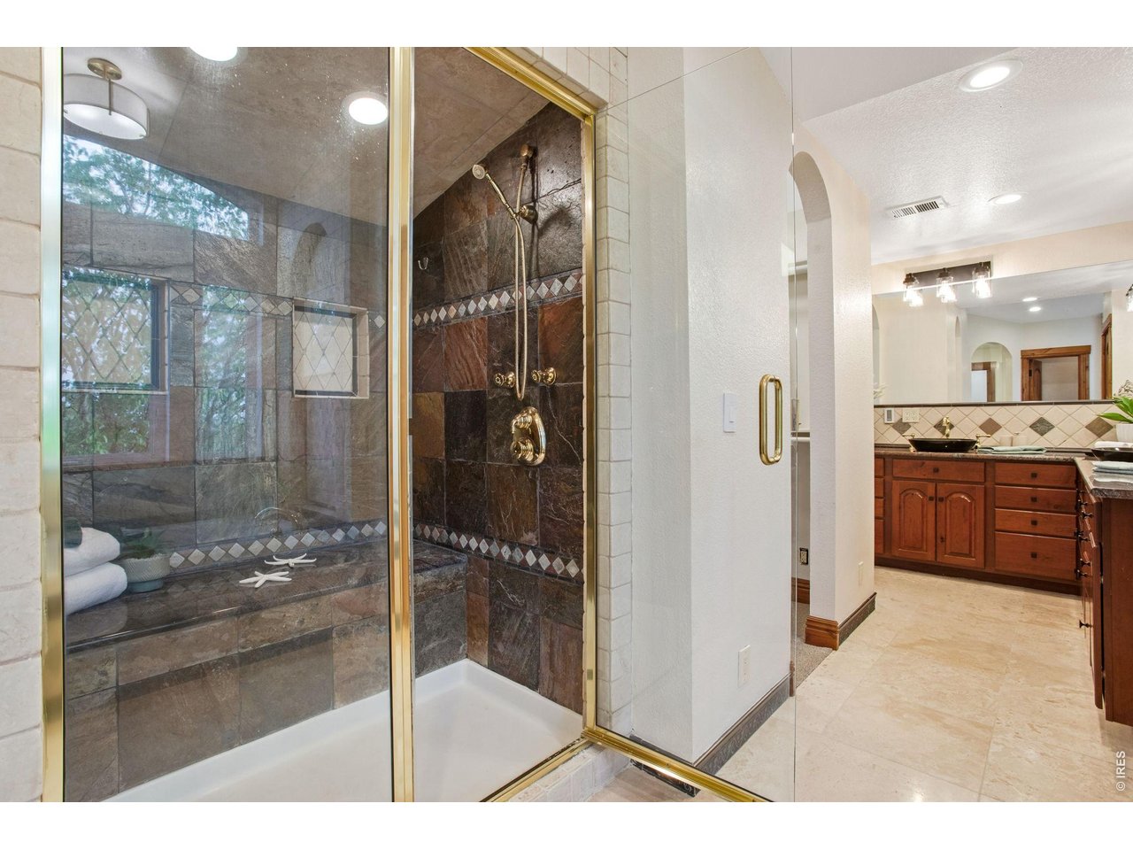 Property Photo 35 2-person shower with full length sitting bench, body jets, wand and overhead shower