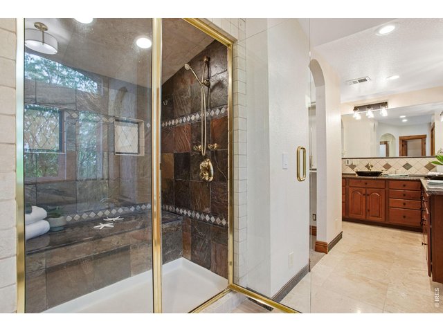 Property Photo 35 2-person shower with full length sitting bench, body jets, wand and overhead shower