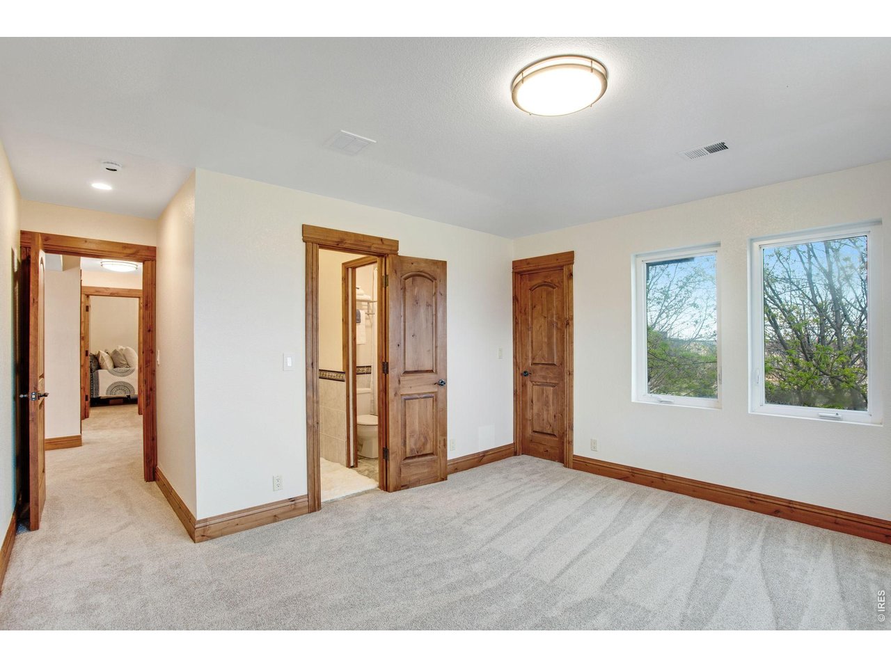 Property Photo 38 Bed 3 of 4 up. Basement features a 5th bedroom or guest suite