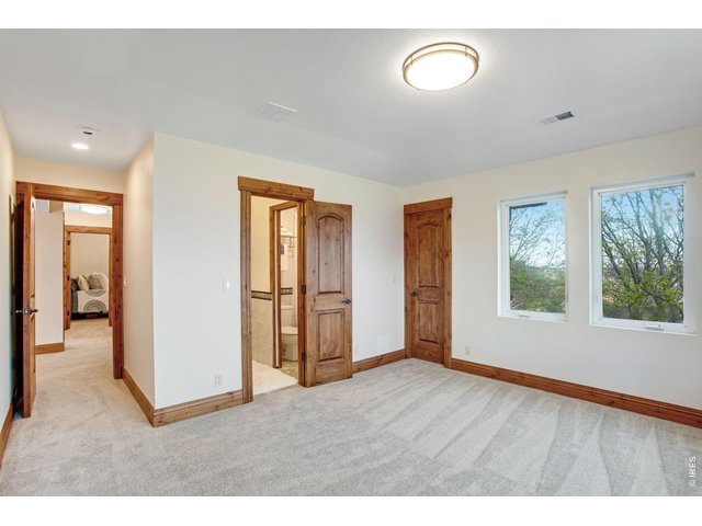 Property Photo 38 Bed 3 of 4 up. Basement features a 5th bedroom or guest suite