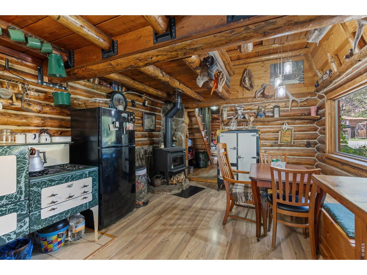 Property Photo 12 Large Cabin interior with rustic log construction