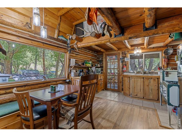 Property Photo 13 Large Cabin kitchen and dining area