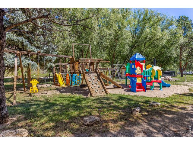 Property Photo 22 Playground area among the campground's mature trees
