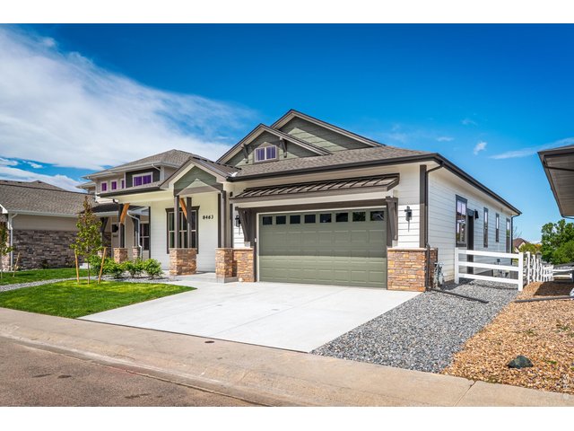 Property Photo 2 Stunning custom ranch-style home with designer finishes and incredible curb appeal in one of Windsor's most sought-after communities.