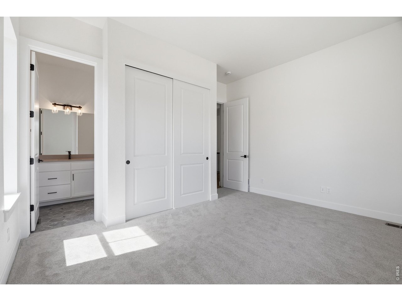 Property Photo 14 Generous closet space and convenient ensuite bath access.