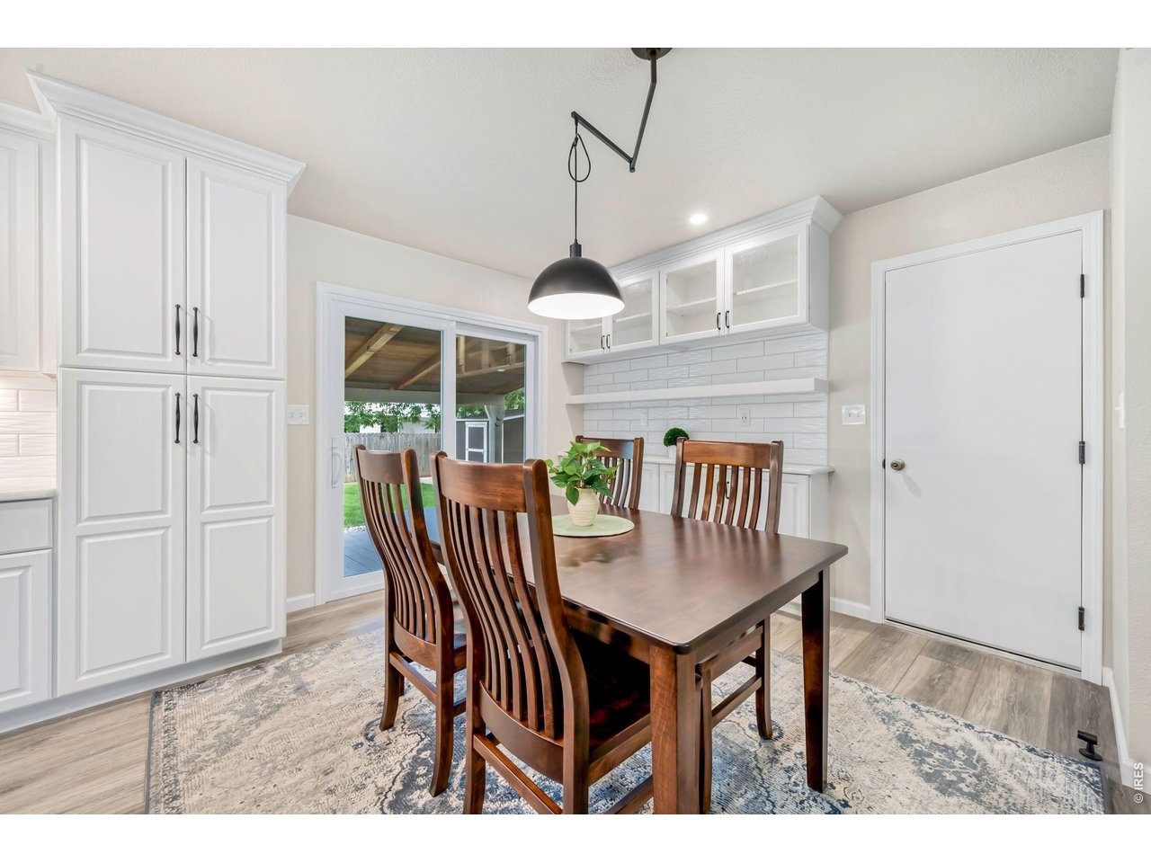 Property Photo 15 Dining area with new sliding glass door that opens to the back deck.