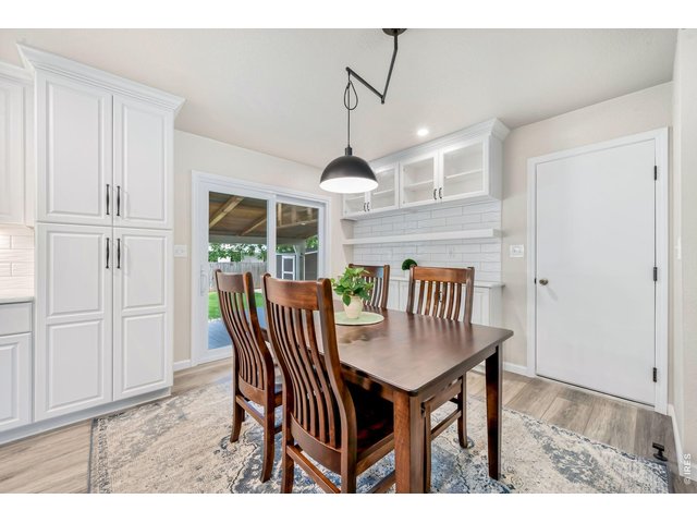 Property Photo 15 Dining area with new sliding glass door that opens to the back deck.
