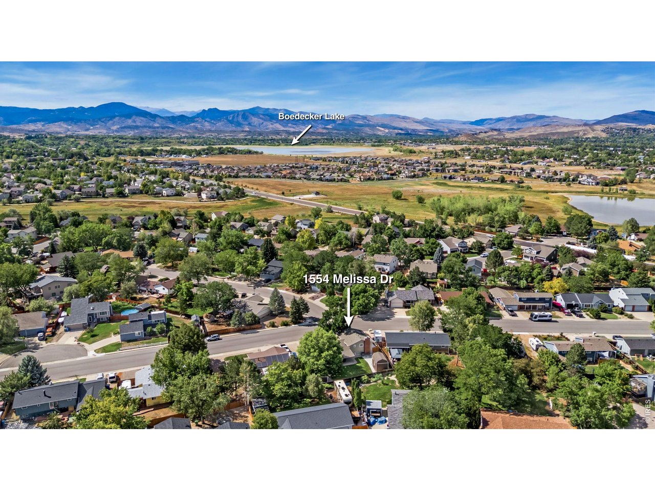 Property Photo 43 Aerial view of home and proximity to Boedecker Lake