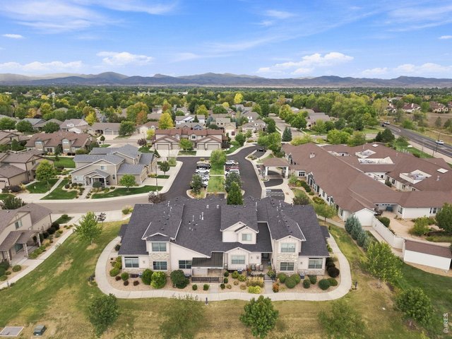 Property Photo 33 Beautiful aerial view showcasing the neighborhood with Colorado mountain views in the distance.