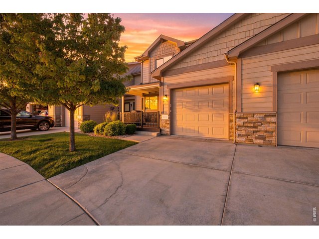Property Photo 1 Beautiful sunset views create a warm welcome at 1974 Pikes Peak Drive.