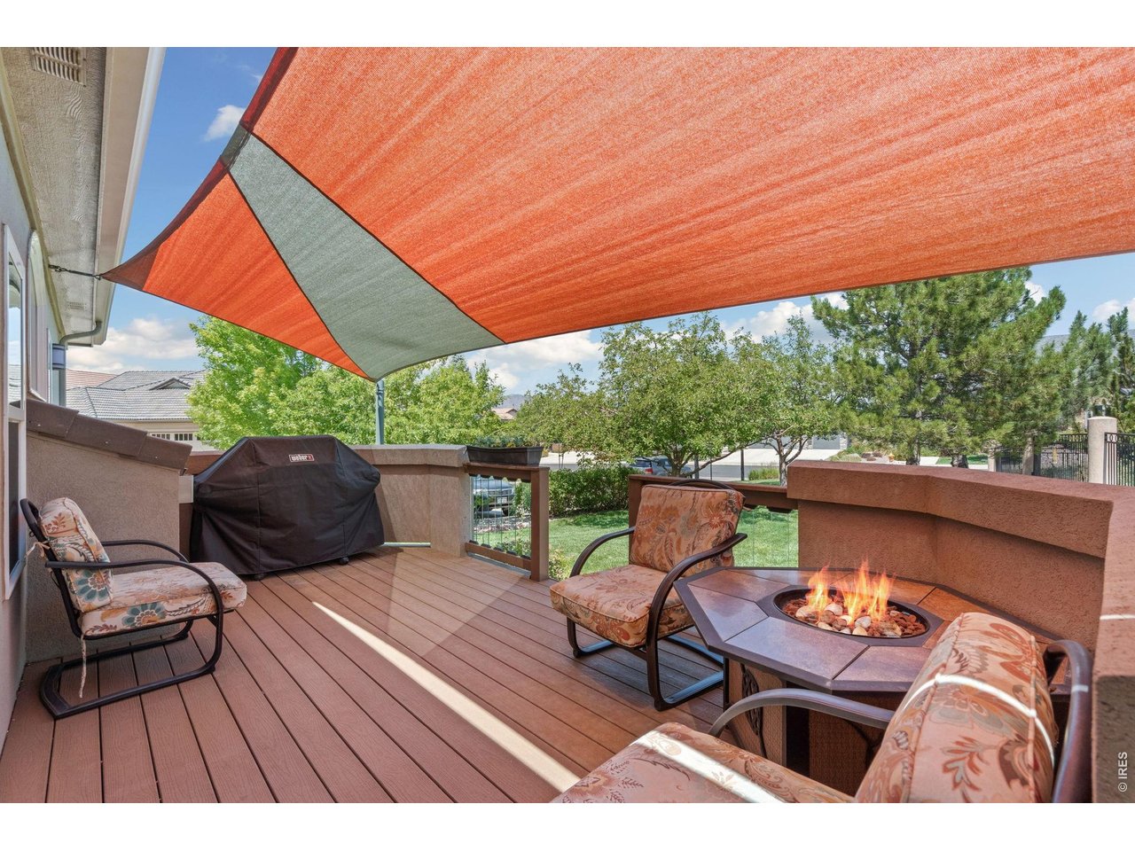 Property Photo 18 This seasonal awning makes a delightful gathering space. Complete with gas grill!