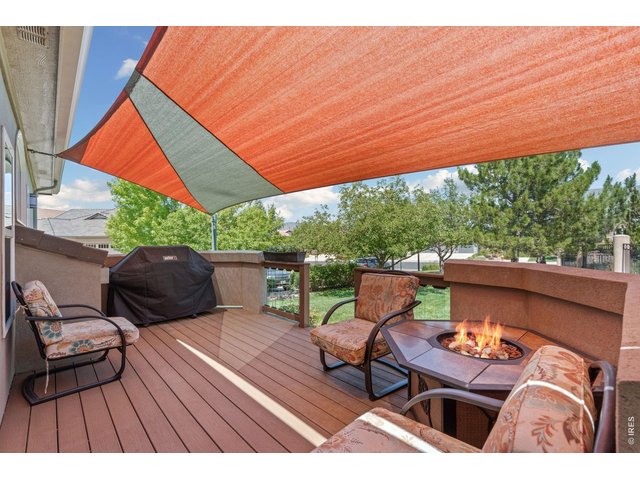 Property Photo 18 This seasonal awning makes a delightful gathering space. Complete with gas grill!