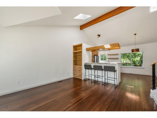 Property Photo 10 Updated engineered bamboo flooring throughout main level.