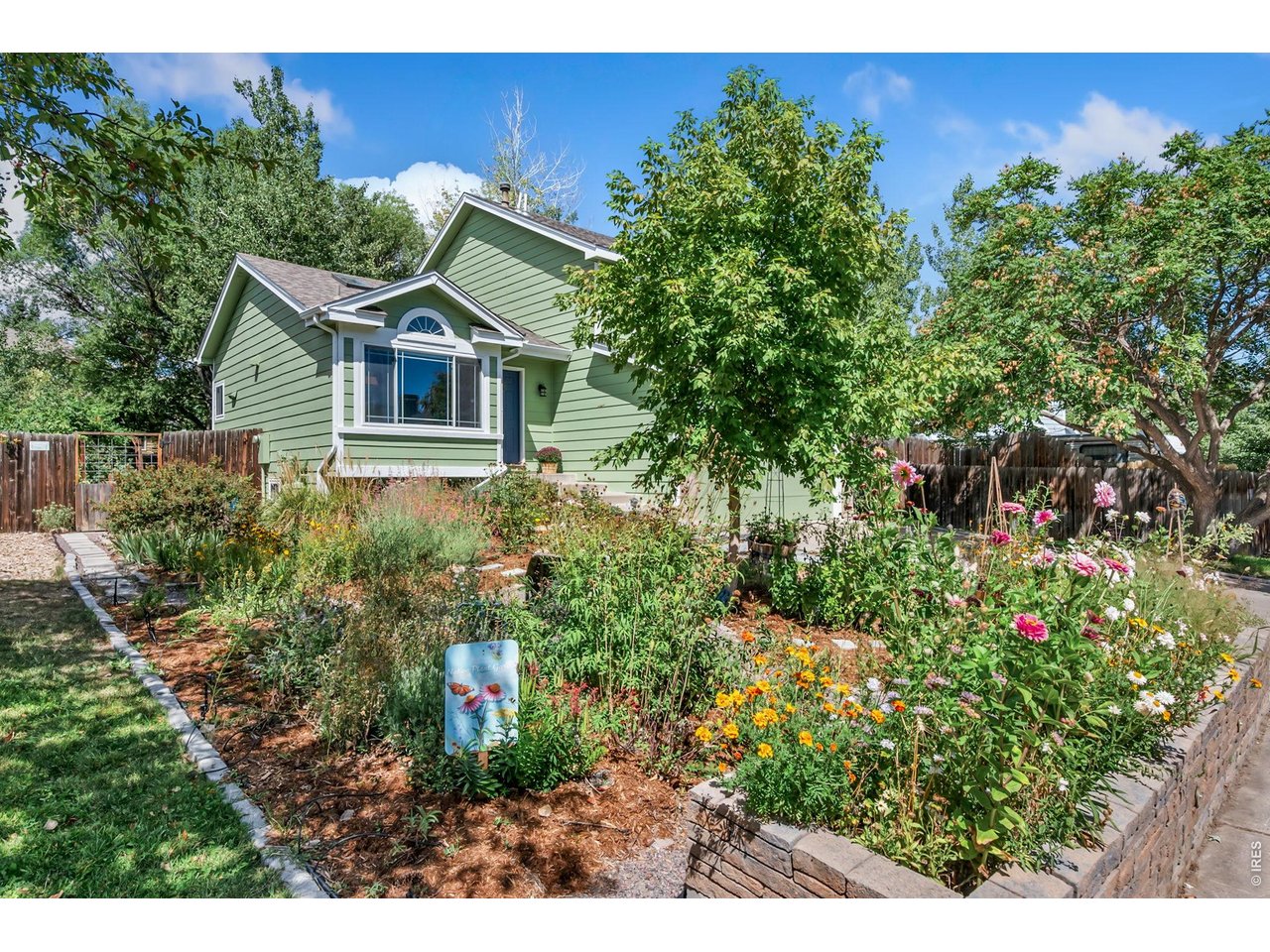 Property Photo 30 Great low-water landscaping and garden beds with sprinklers front and back