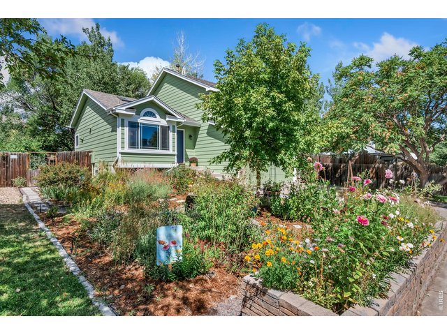 Property Photo 30 Great low-water landscaping and garden beds with sprinklers front and back