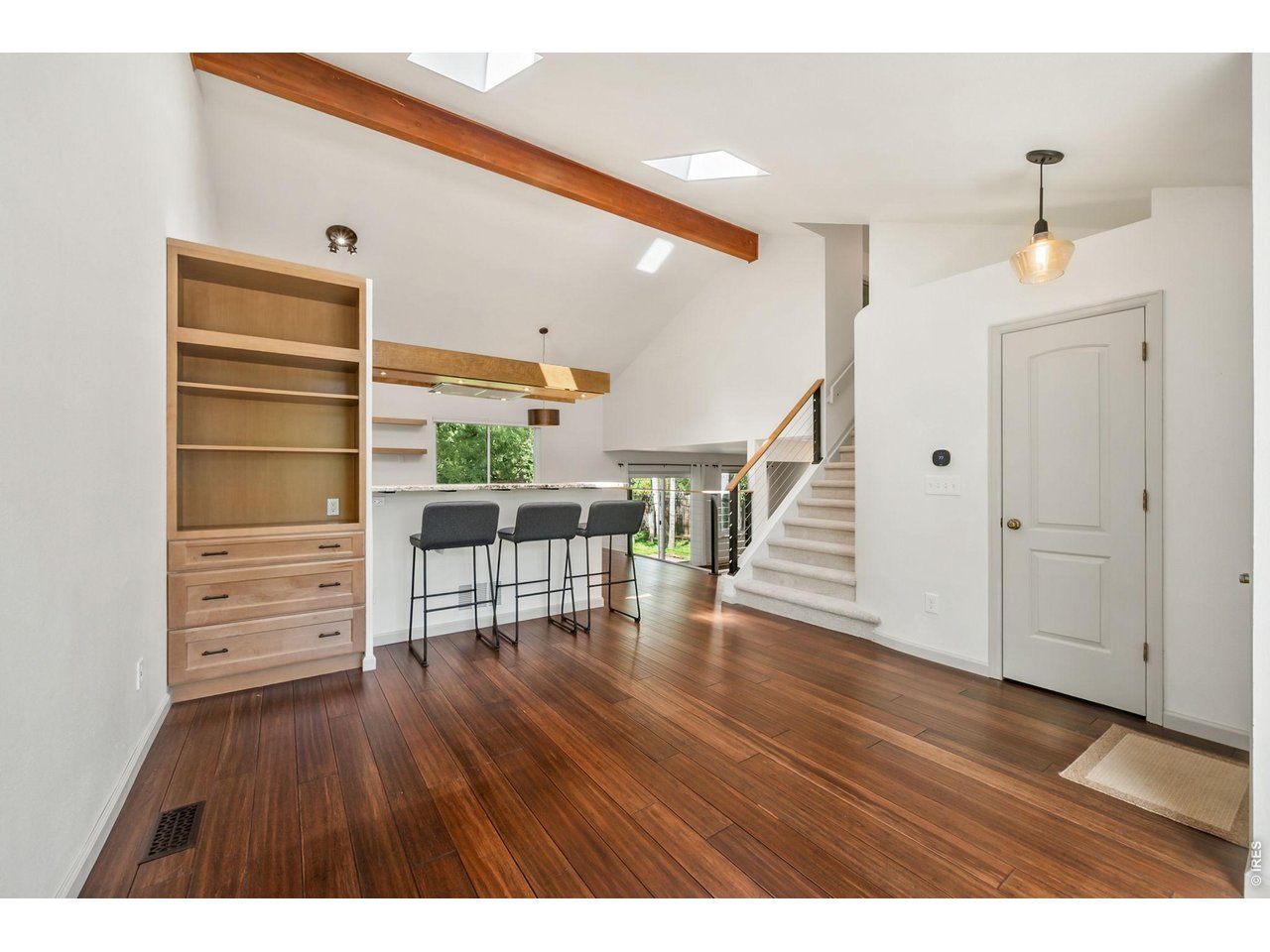 Property Photo 9 Updated engineered bamboo flooring throughout main level.