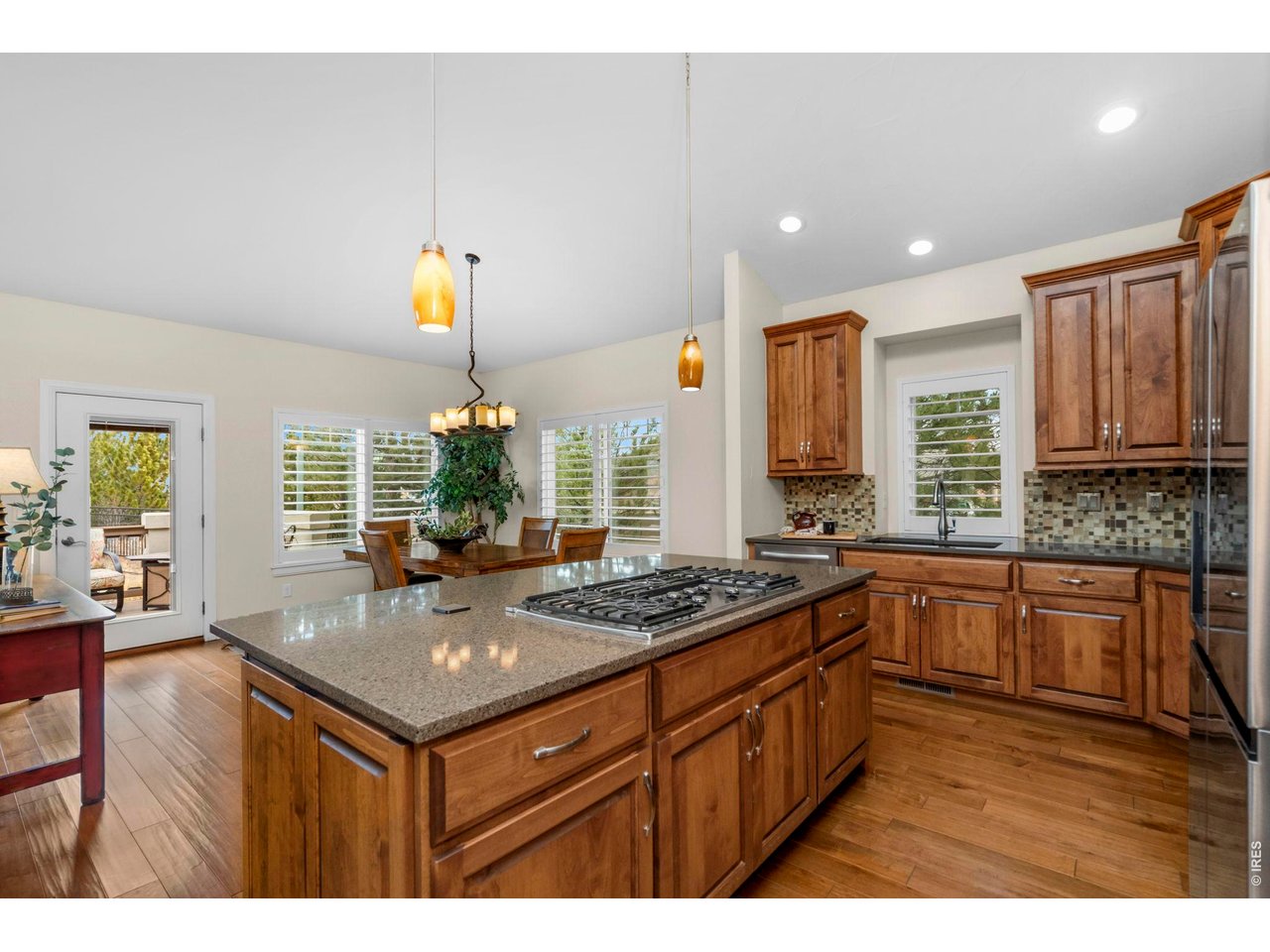 Property Photo 26 Open Kitchen, Dining and Living Space-- feels cozy, yet accommodating for a gathering!