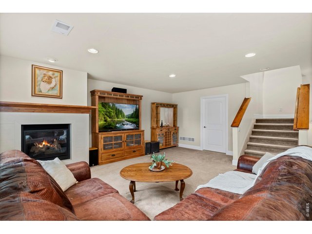 Property Photo 13 This basement does not disappoint! Gas Fireplace, huge open Family Room Space, 2 bedrooms and a full bath, not to mention lots of storage!