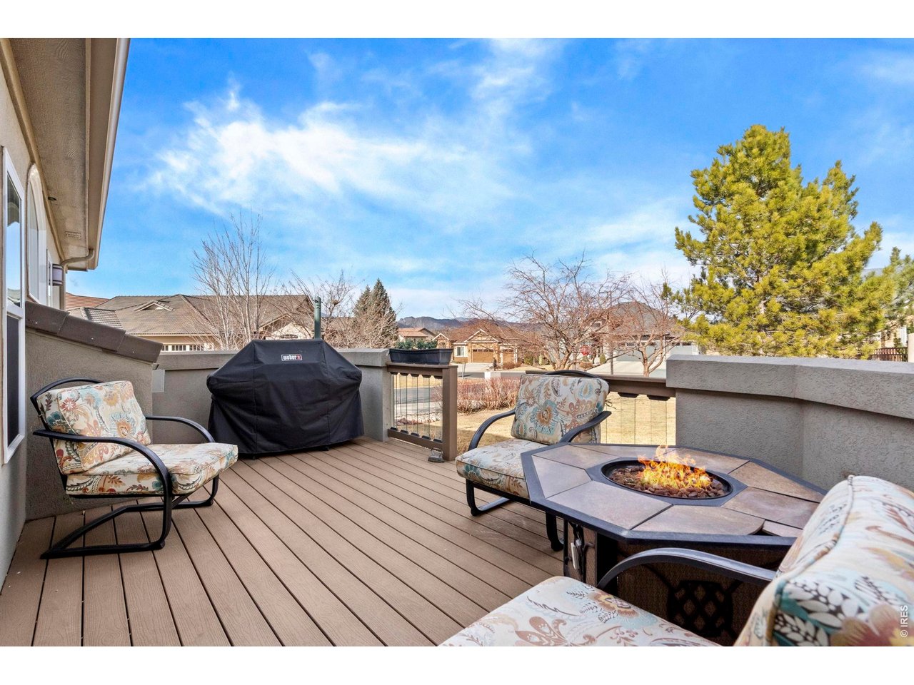 Property Photo 40 Deck includes a gas firepit, patio furniture and gas grill