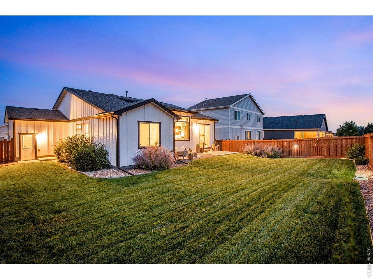 Property Photo 17 Beautiful perennials, lush & comfortable yard ready for enjoyment or just peace of mind.