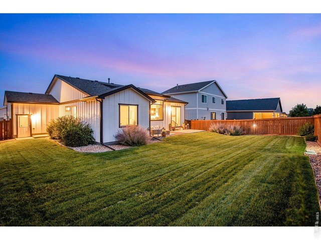Property Photo 17 Beautiful perennials, lush & comfortable yard ready for enjoyment or just peace of mind.