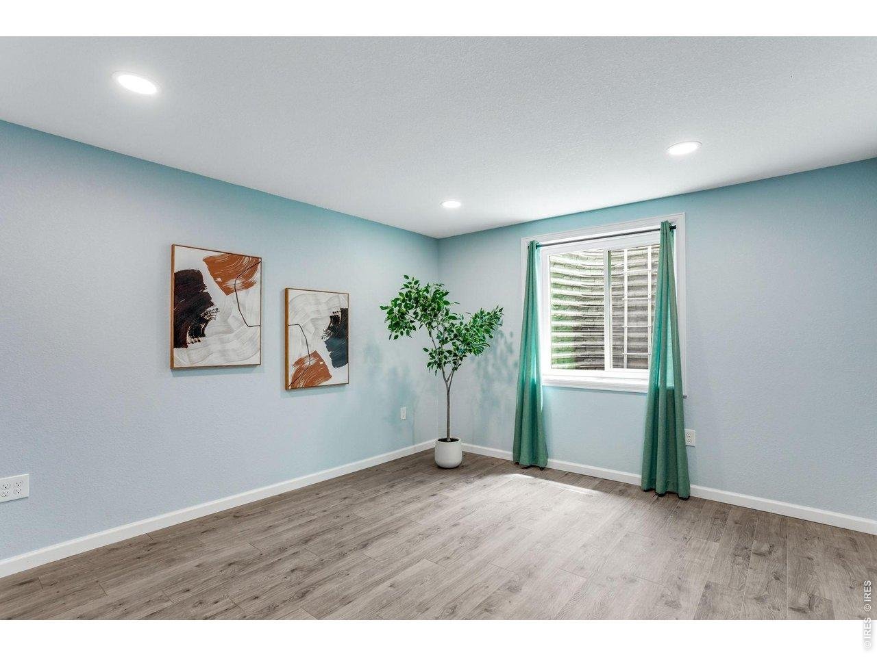 Property Photo 28 Oversized Bedroom Suite #4 newly finished permitted in the lower level 2022 13 x 12