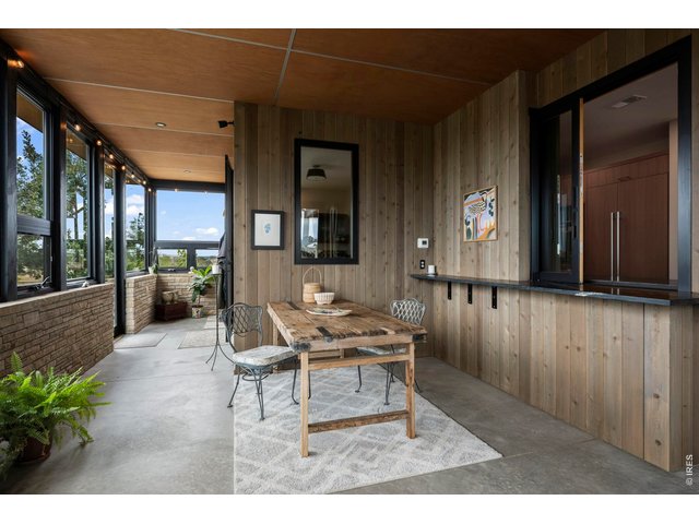 Property Photo 16 So many fun meals on the porch. Pass through window to kitchen.