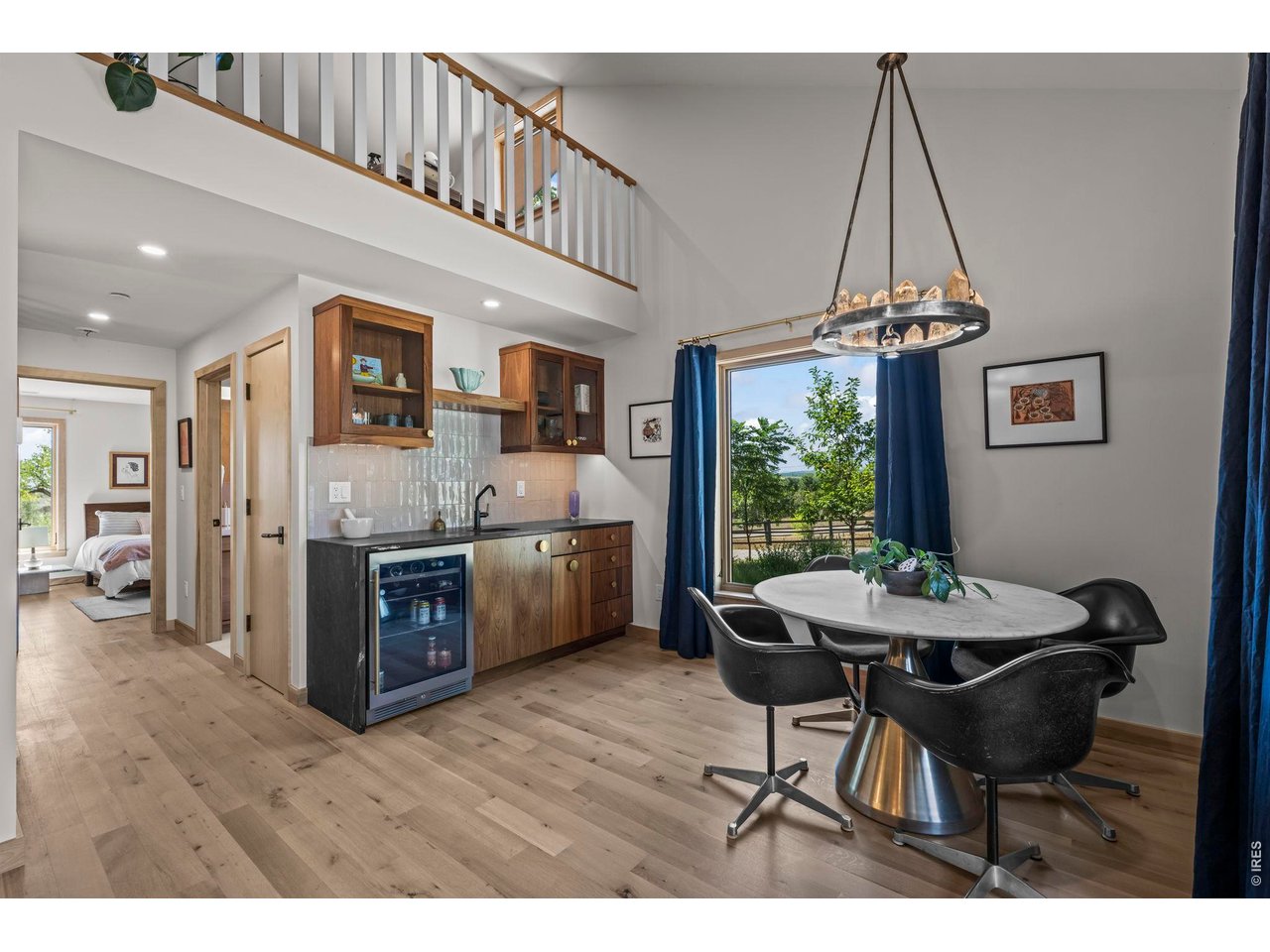 Property Photo 28 With wet bar, beverage frig, room for dining or games - and upstairs loft