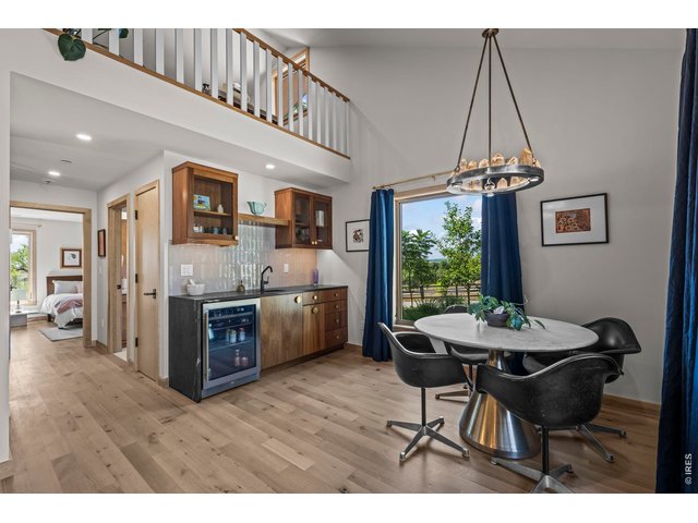 Property Photo 28 With wet bar, beverage frig, room for dining or games - and upstairs loft