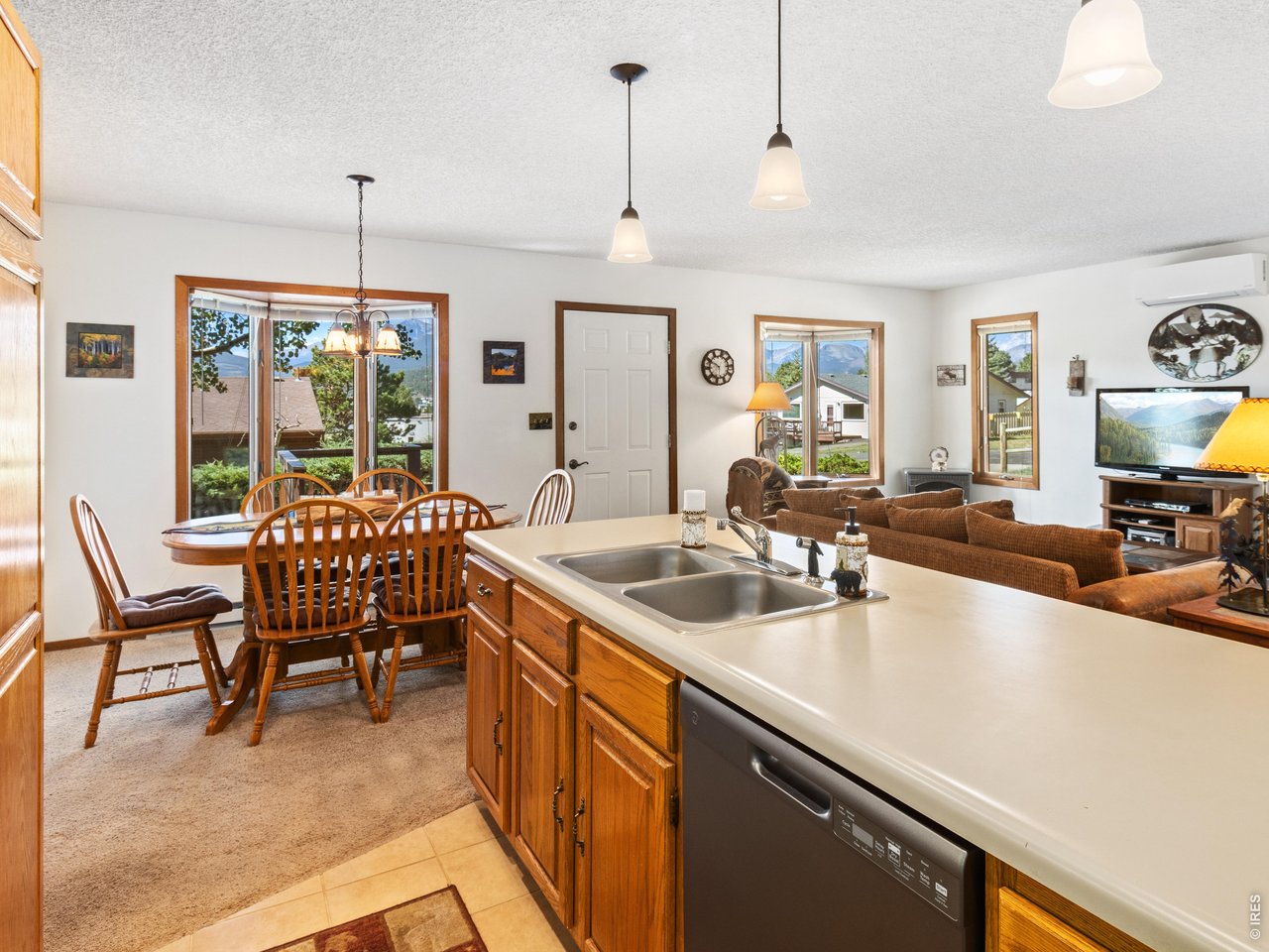 Property Photo 15 Easy living with an open-concept great room, living and dining areas